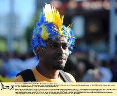 A Ukraine fan before kick off at the Donbass Arena, Donetsk, Ukraine 