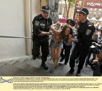 A protest action from the FEMEN women s movement in the UEFA EURO 2012 fan zoneon June 19, 2012 in Kyiv, Ukraine. 