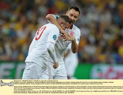 Football - Euro 2012 - England vs. Ukraine England s Wayne Rooney celebrates scoring their opening goal with John Terry at the Donbass Arena, Donetsk, Ukraine 
