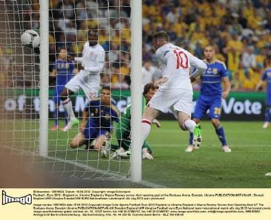 Football - Euro 2012 - England vs. Ukraine England s Wayne Rooney scores their opening goal at the Donbass Arena, Donetsk, Ukraine 