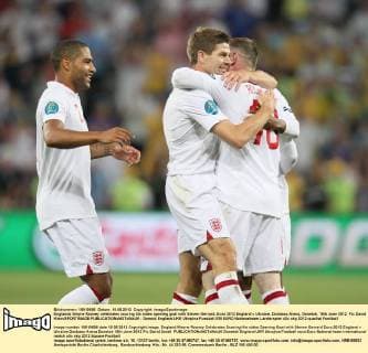 Englands Wayne Rooney celebrates scoring his sides opening goal with Steven Gerrard..Euro 2012 England v Ukraine, Donbass Arena, Donetsk, 19th June 2012. Pic David Klein SPORTIMAGE EDITORIAL USE ONLY. No use with unauthorised audio, video, data, fixture lists, club league logos or live services. Online in-match use limited to 120 images, no video emulation. No use in betting, games or single club league player publications.