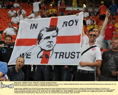 England fans hold up a banner in support of manager Roy Hodgson: In Roy we trust 