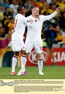 FUSSBALL - EURO 2012, ENG vs UKR DONETSK,UKRAINE,19.JUN.12 - FUSSBALL - UEFA Europameisterschaft 2012 in Polen und der Ukraine, Länderspiel, Gruppenphase, England vs Ukraine. Bild zeigt den Jubel von Ashley Young und Wayne Rooney (ENG). 