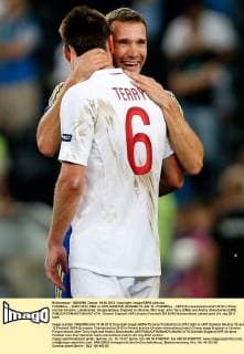 FUSSBALL - EURO 2012, ENG vs UKR DONETSK,UKRAINE,19.JUN.12 - FUSSBALL - UEFA Europameisterschaft 2012 in Polen und der Ukraine, Länderspiel, Gruppenphase, England vs Ukraine. Bild zeigt John Terry (ENG) und Andriy Shevchenko (UKR). 