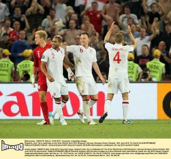 Englands John Terry celebrates at the final whistle..Euro 2012 England v Ukraine, Donbass Arena, Donetsk, 19th June 2012. Pic David Klein SPORTIMAGE EDITORIAL USE ONLY. No use with unauthorised audio, video, data, fixture lists, club league logos or live services. Online in-match use limited to 120 images, no video emulation. No use in betting, games or single club league player publications.