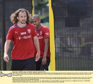 EURO, 2012. Petr Jiracek (left) and Theodor Gebre Selassie of the Czech national soccer team leave the pitch after the closed training session in Wroclaw, Poland on June 19, 2012. (CTKxPhoto KaterinaxSulova)  CTKPhoto717201206190351201