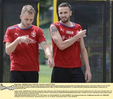 EURO, 2012. Michal Kadlec (left) and Tomas Sivok of the Czech national soccer team leave the pitch after the closed training session in Wroclaw, Poland on June 19, 2012. (CTKxPhoto KaterinaxSulova)  CTKPhoto720201206190351301