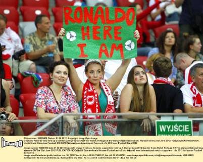Cristiano Ronaldo fans hold up a banner..Euro 2012 QuarterFinal match, Portugal at the Warsaw National Stadium, Warsaw on the 21st June 2012. EDITORIAL USE ONLY. No use with unauthorised audio, video, data, fixture lists, club league logos or live services. Online in-match use limited to 120 images, no video emulation. No use in betting, games or single club league player publications.