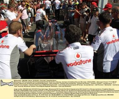 Motorsports: FIA Formula One World Championship 2012, Grand Prix of Europe, mechanic of Vodafone McLaren Mercedes xHOCHxZWEIx
