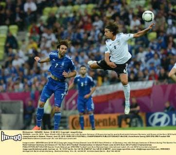 GDANSK, June 22, 2012 - Sami Khedira (R) of Germany vies with Giorgos Samaras of Greece during the quarterfinal match between Germany and Greece at the Euro 2012 football championships in Gdansk, Poland, June 22, 2012. EURO 2012 FOOTBALL CHAMPIONSHIPS 