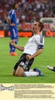Football - European Championships 2012 - Germany vs. Greece Philipp Lahm of Germany celebrates scoring the opening goal at the Baltic Arena, Gdansk 