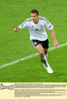 Miroslav Klose of Germany celebrates after scoring during the quarterfinal match between Germany and Greece at the Euro 2012 football championships in Gdansk, Poland, June 22, 2012. (Xinhua Liu Lihang) (jyc) POLAND-GDANSK-EURO 2012 FOOTBALL CHAMPIONSHIPS-GERMANY VS GREECE 