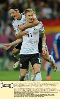 GDANSK, June 22, 2012 - Marco Reus (Front) of Germany celebrates after scoring with his teammate Mesut Oezil during the quarterfinal match between Germany and Greece at the Euro 2012 football championships in Gdansk, Poland, June 22, 2012. Germany won 4-2. (Xinhua Ma Ning) (jyc) POLAND-GDANSK-EURO 2012 FOOTBALL CHAMPIONSHIPS-GERMANY VS GREECE 