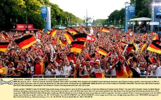 BERLIN June 22, 2012 - Fans of German national football team watch the EURO 2012 quarterfinal football match between Germany and Greece during a public viewing event in Berlin, June 22, 2012. Germany won 4-2 and was qualified for the semi-final. (Xinhua Pan Xu) GERMANY-BERLIN-EURO 2012-FAN 