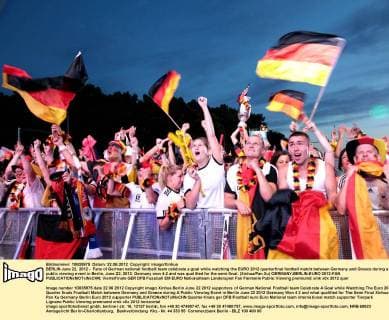 BERLIN June 22, 2012 - Fans of German national football team celebrate a goal while watching the EURO 2012 quarterfinal football match between Germany and Greece during a public viewing event in Berlin, June 22, 2012. Germany won 4-2 and was qualified for the semi-final. (Xinhua Pan Xu) GERMANY-BERLIN-EURO 2012-FAN 