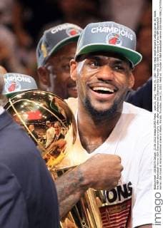 June 21, 2012 - Miami, FL, USA - Miami Heat small forward LeBron James (6) holds the NBA Basketball Herren USA Championship trophy after after defeated the Oklahoma City Thunder 121-106 in Game 5 of the NBA Basketball Herren USA Finals at AmericanAirlines Arena in Miami, Florida, Thursday, June 21, 2012. Heat vs. Thunder in NBA Basketball Herren USA Finals - ZUMAm67