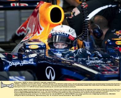 (120623) -- VALENCIA, June 23, 2012 (Xinhua) -- Red Bull German driver Sebastian Vettel waits in the pits during the third practice race of the European Formula One Grand Prix at the Valencia Street Circuit in Valencia, Spain, June 23, 2012. (Xinhua Xie Haining) SPAIN-VALENCIA-F1-EUROPEAN GRAND PRIX-THIRD PRACTICE 