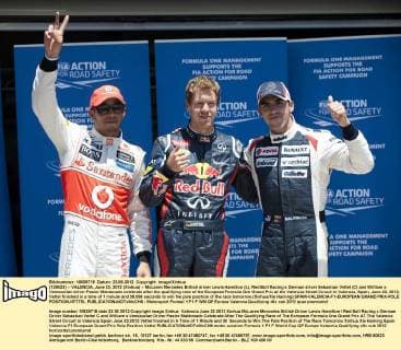 (120623) -- VALENCIA, June 23, 2012 (Xinhua) -- McLaren Mercedes British driver Lewis Hamilton (L), Red Bull Racing s German driver Sebastian Vettel (C) and William s Venezuelan driver Pastor Maldonado celebrate after the qualifying race of the European Formula One Grand Prix at the Valencia Street Circuit in Valencia, Spain, June 23, 2012. Vettel finished in a time of 1 minute and 38.086 seconds to win the pole position of the race tomorrow.(Xinhua Xie Haining) SPAIN-VALENCIA-F1-EUROPEAN GRAND PRIX-POLE POSITION-VETTEL 