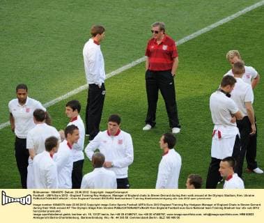Football - UEFA Euro 2012 - England Training Roy Hodgson, Manager of England chats to Steven Gerrard during their walk around at the Olympic Stadium, Kiev, Ukraine 