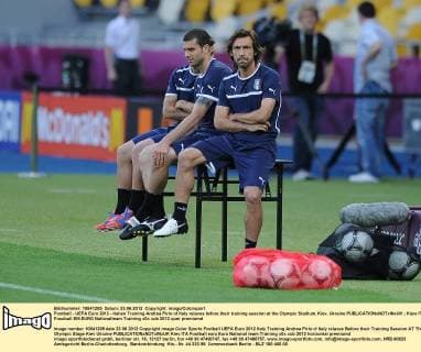 Football - UEFA Euro 2012 - Italien Training Andrea Pirlo of Italy relaxes before their training session at the Olympic Stadium, Kiev, Ukraine 