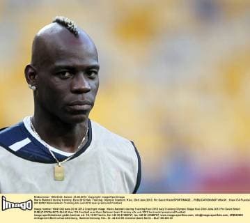 Mario Balotelli during training..Euro 2012 Italy Training, Olympic Stadium, Kiev, 23rd June 2012. Pic David Klein SPORTIMAGE... EDITORIAL USE ONLY. No use with unauthorised audio, video, data, fixture lists, club league logos or live services. Online in-match use limited to 120 images, no video emulation. No use in betting, games or single club league player publications.
