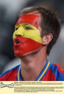 DONETSK, June 23, 2012 -- A fan for Spain reacts before the quarterfinal match at the Euro 2012 football championships in Donetsk, June 23, 2012. 
