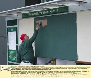 23.06.2012. Wimbledon, London. Staff add final touches to the grounds and facilities days before the opening of the The Wimbledon Tennis Championships 2012 to be held at The All England Lawn Tennis and Croquet Club, London, England. xDuncanxGrovex  ActionPlus11294870