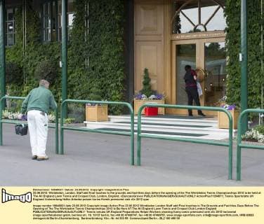 23.06.2012. Wimbledon, London. Staff add final touches to the grounds and facilities days before the opening of the The Wimbledon Tennis Championships 2012 to be held at The All England Lawn Tennis and Croquet Club, London, England. xDuncanxGrovex  ActionPlus11294871