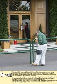 23.06.2012. Wimbledon, London. Staff add final touches to the grounds and facilities days before the opening of the The Wimbledon Tennis Championships 2012 to be held at The All England Lawn Tennis and Croquet Club, London, England. xDuncanxGrovex  ActionPlus11294872