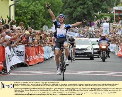 Fabian WEGMANN ( GER Garmin - Barracuda ) gewinnt zum dritten Mal die Deutschen Strassenmeisterschaften - Finish - Aktion - quer - Event: Deutsche Meisterschaften - Strasse - Location: Grimma - Deutschland - Europa - Datum: 24.06.2012 - Contact