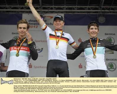 Podium v.l.n.r. - (2.) Linus GERDEMANN ( GER Team RadioShack - Nissan ) - (1.) Fabian WEGMANN ( GER Garmin - Barracuda ) - (3.) Julian KERN ( GER Team Leopard - Trek ) - Siegerehrung - Jubel - Freude - Emotionen - quer - Event: Deutsche Meisterschaften - Strasse - Location: Grimma - Deutschland - Europa - Datum: 24.06.2012 - Contact