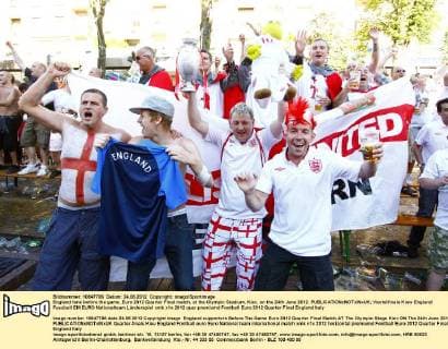 England fans before the game..Euro 2012 Quarter Final match, at the Olympic Stadium, Kiev, on the 24th June 2012. EDITORIAL USE ONLY. No use with unauthorised audio, video, data, fixture lists, club league logos or live services. Online in-match use limited to 120 images, no video emulation. No use in betting, games or single club league player publications.