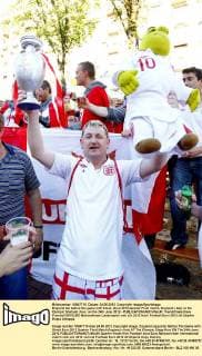 England fan before the game with Shrek -Euro 2012 Quarter Final match, England v Italy at the Olympic Stadium, Kiev, on the 24th June 2012 - EDITORIAL USE ONLY. No use with unauthorised audio, video, data, fixture lists, club league logos or live services. Online in-match use limited to 120 images, no video emulation. No use in betting, games or single club league player publications.