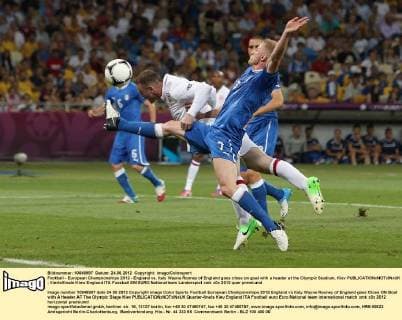 Football - European Championships 2012 - England vs. Italy Wayne Rooney of England goes close on goal with a header at the Olympic Stadium, Kiev 