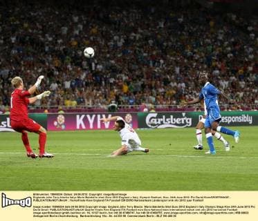 Englands John Terry blocks Italys Mario Balotellis shot..Euro 2012 England v Italy, Olympic Stadium, Kiev, 24th June 2012. Pic David Klein SPORTIMAGE... EDITORIAL USE ONLY. No use with unauthorised audio, video, data, fixture lists, club league logos or live services. Online in-match use limited to 120 images, no video emulation. No use in betting, games or single club league player publications.
