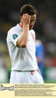 Football - European Championships 2012 - England vs. Italy Scott Parker of England scratches his head at the Olympic Stadium, Kiev 