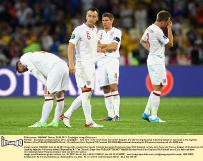 Football - European Championships 2012 - England vs. Italy John Terry and Steven Gerrard of England are left looking dejected following defeat on penalties at the Olympic Stadium, Kiev 