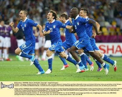 Football - European Championships 2012 - England vs. Italy Leonardo Bonucci, Andrea Pirlo and Mario Balotelli of Italy run forward following victory on penalties at the Olympic Stadium, Kiev 