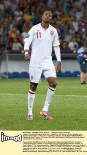 Football - European Championships 2012 - England vs. Italy Ashley Young of England looks dejected following his penalty miss at the Olympic Stadium, Kiev 