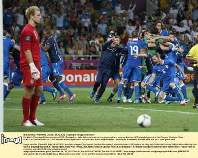 Football - European Championships 2012 - England vs. Italy Italy celebrate victory on penalties, leaving Joe Hart of England dejected at the Olympic Stadium, Kiev 