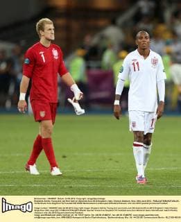 Englands Ashley Young and Joe Hart look on dejected..Euro 2012 England v Italy, Olympic Stadium, Kiev, 24th June 2012. EDITORIAL USE ONLY. No use with unauthorised audio, video, data, fixture lists, club league logos or live services. Online in-match use limited to 120 images, no video emulation. No use in betting, games or single club league player publications.