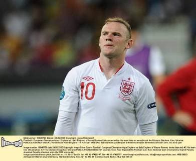 Football - European Championships - England vs. Italy England s Wayne Rooney looks dejected as his team lose on penalties at the Olympic Stadium, Kiev, Ukraine 