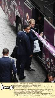 Joleon Lescott and Joe Hart England s national soccer players board an Euro 2012 official bus as they leave the team hotel in Krakow June 25, 2012. lemi_120625 