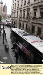 England s national soccer players board an Euro 2012 official bus as they leave the team hotel in Krakow June 25, 2012. lemi_120625 