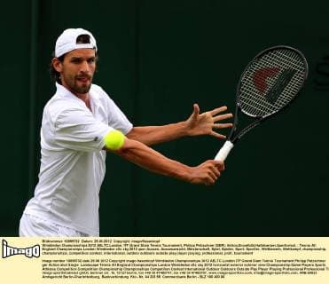 Wimbledon Championships 2012 AELTC,London, ITF Grand Slam Tennis Tournament, Philipp Petzschner (GER); Aktion,Einzelbild,Halbkoerper,Querformat,