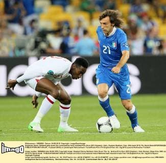 Englands Danny Welbeck gets given the runaround by Italys Andrea Pirlo..Euro 2012 England v Italy, Olympic Stadium, Kiev, 24th June 2012. Pic David Klein SPORTIMAGE... EDITORIAL USE ONLY. No use with unauthorised audio, video, data, fixture lists, club league logos or live services. Online in-match use limited to 120 images, no video emulation. No use in betting, games or single club league player publications.