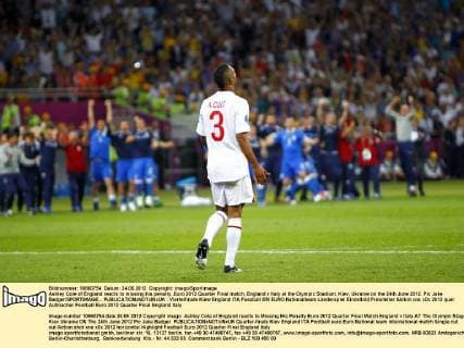 Ashley Cole of England reacts to missing his penalty..Euro 2012 Quarter Final match, England v Italy at the Olympic Stadium, Kiev, Ukraine on the 24th June 2012. Pic Jake Badger SPORTIMAGE... EDITORIAL USE ONLY. No use with unauthorised audio, video, data, fixture lists, club league logos or live services. Online in-match use limited to 120 images, no video emulation. No use in betting, games or single club league player publications.