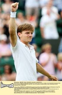 David Goffin of Belgium celebrates during the first round match of men s singles at the Wimbledon Championships 2012 in London 