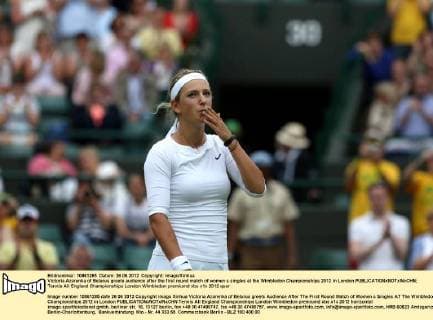 Victoria Azarenka of Belarus greets audience after the first round match of women s singles at the Wimbledon Championships 2012 in London 