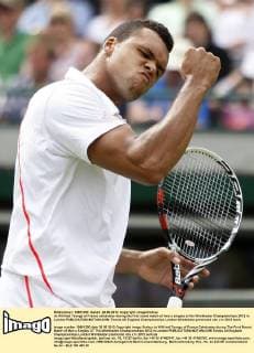 Jo-Wilfried Tsonga of France celebrates during the first round match of men s singles at the Wimbledon Championships 2012 in London 